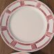 Eight Badonviller dinner plates