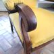 Yellow Voltaire armchair