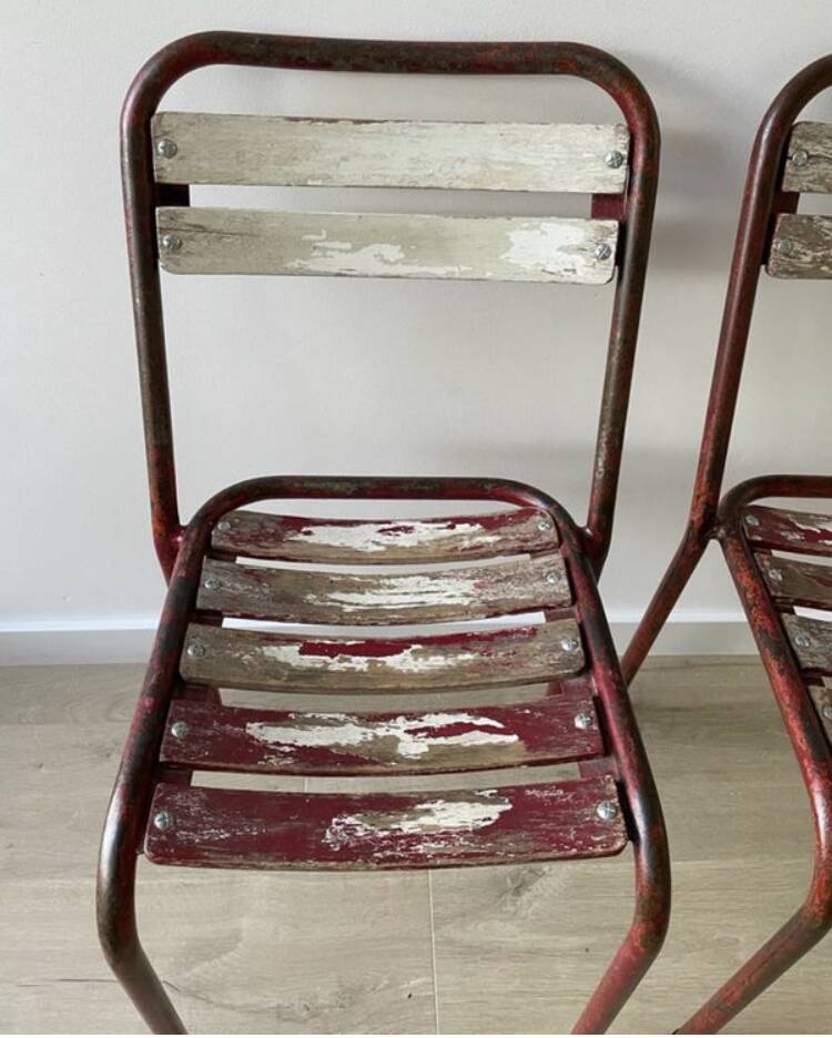 Pair of antique Tolix-style wooden and metal bistro chairs