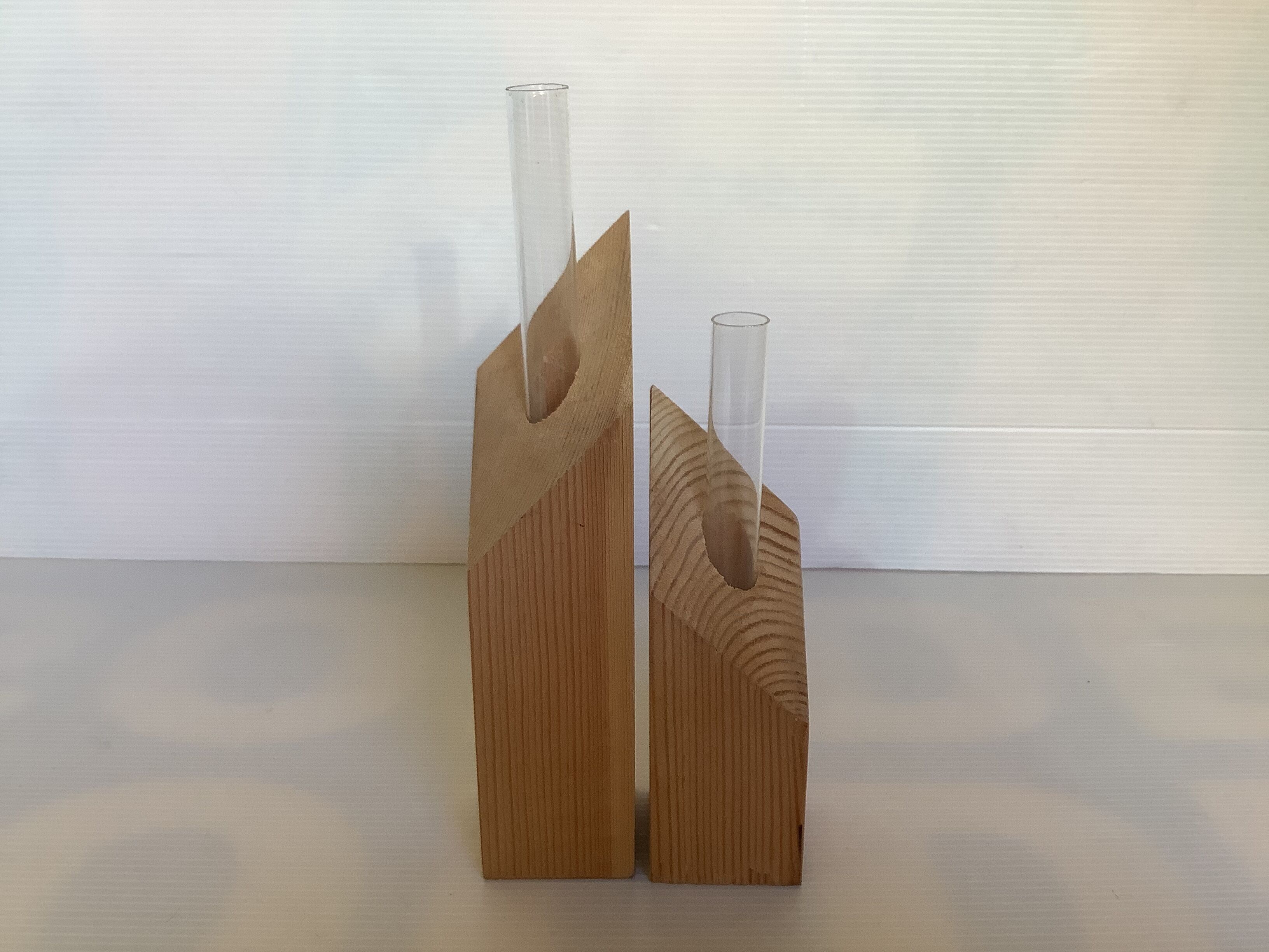 Pair of diamond-shaped wooden Scandinavian test tube vases.