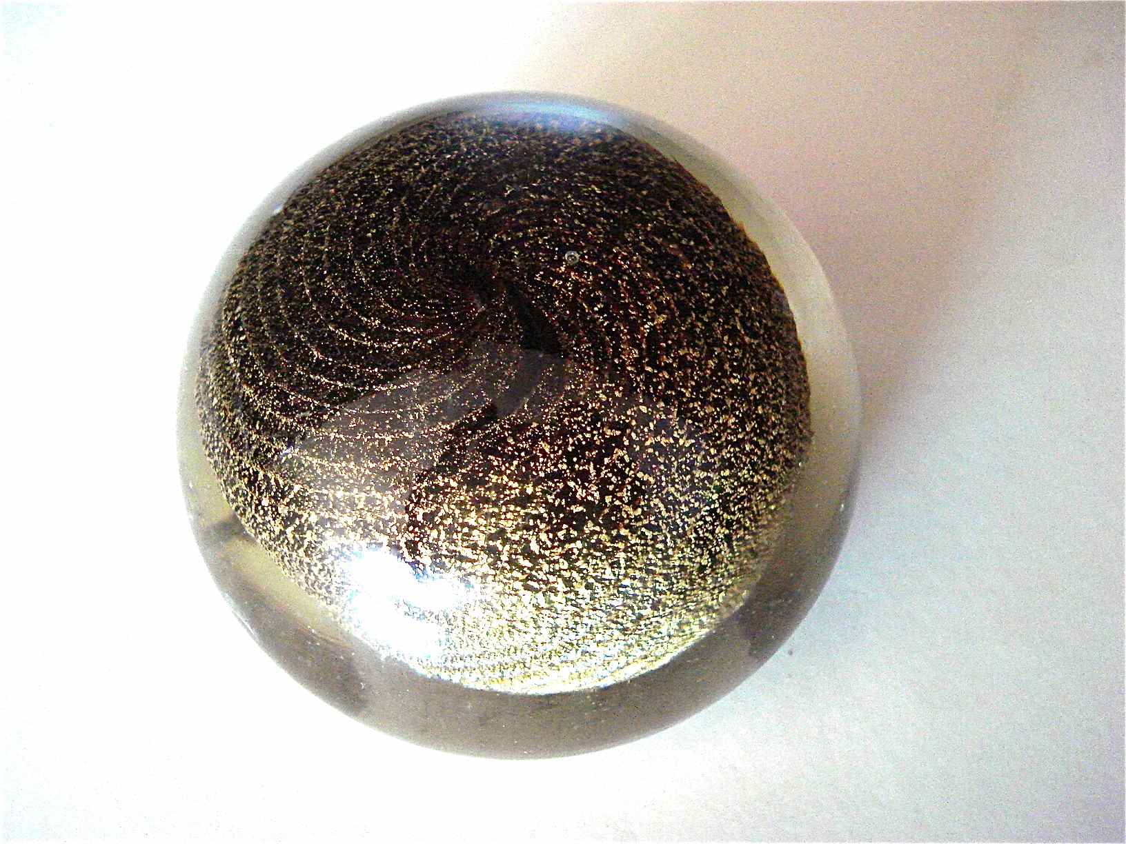 Gold spiral paper press