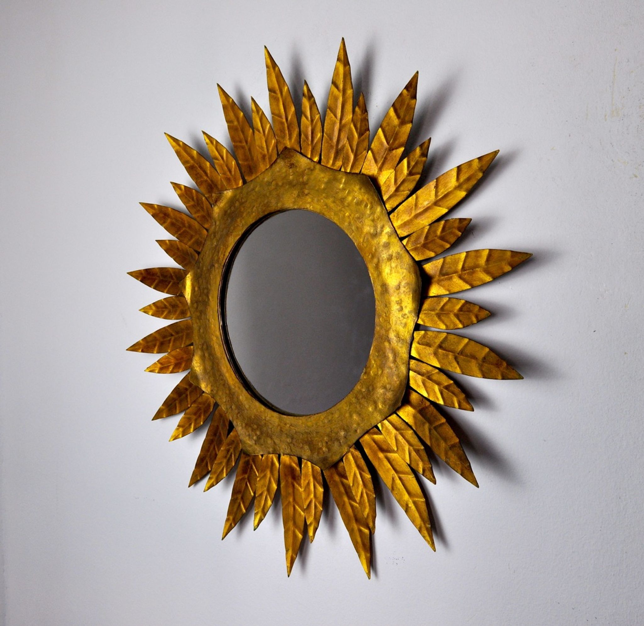 Miroir soleil, gilded metal with gold leaf, Italy, 1960