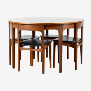 Midcentury extending round teak table and chairs by Nathan