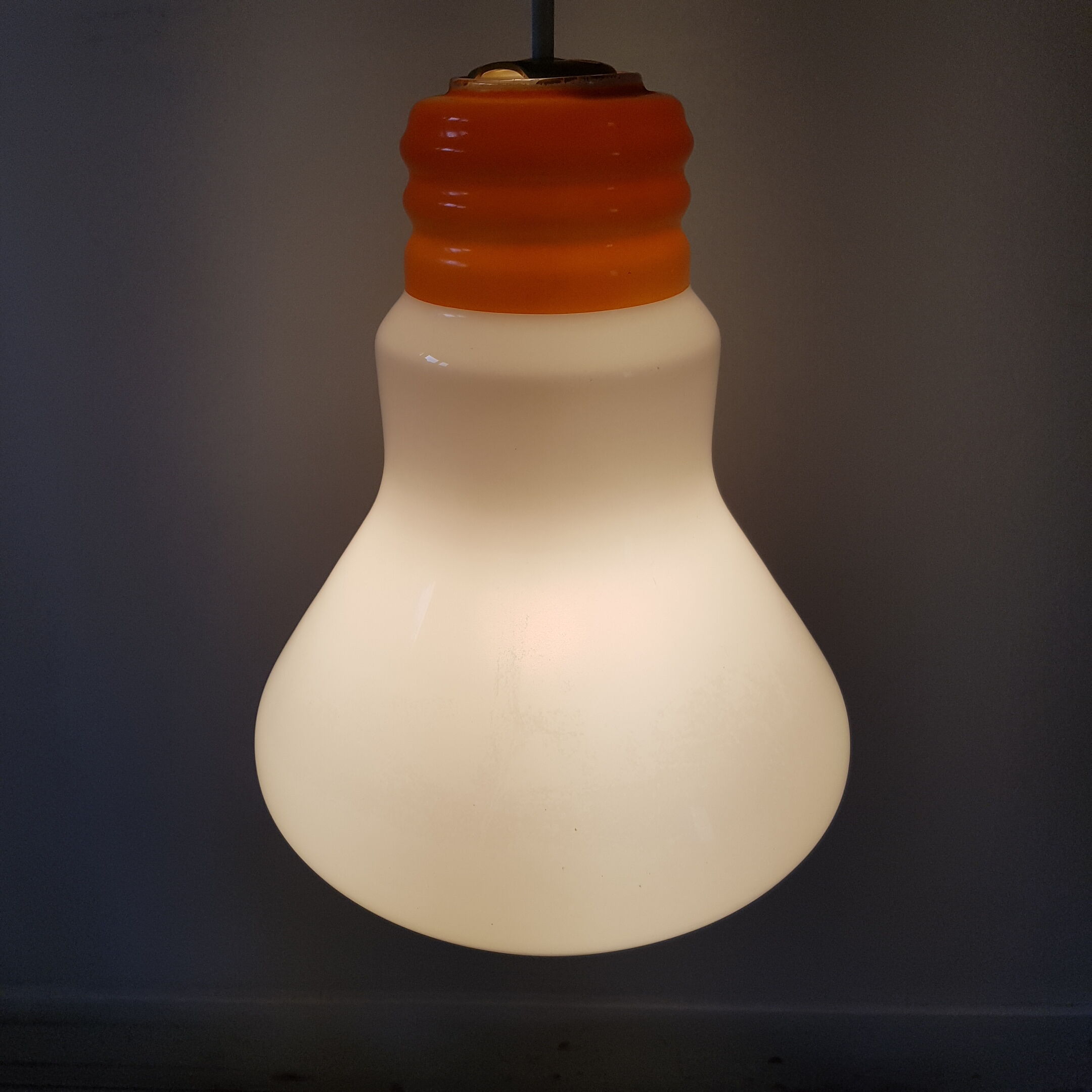 Light bulb with opaque glass hanging lamp