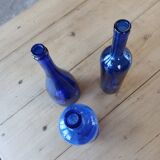 3 blue bottles