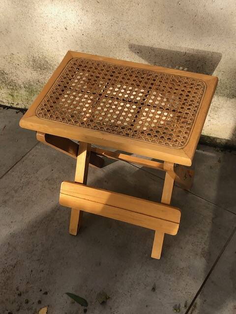 Wooden and cane bedside table