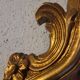 Miroir en bois d'or à  l or,style Louis 15