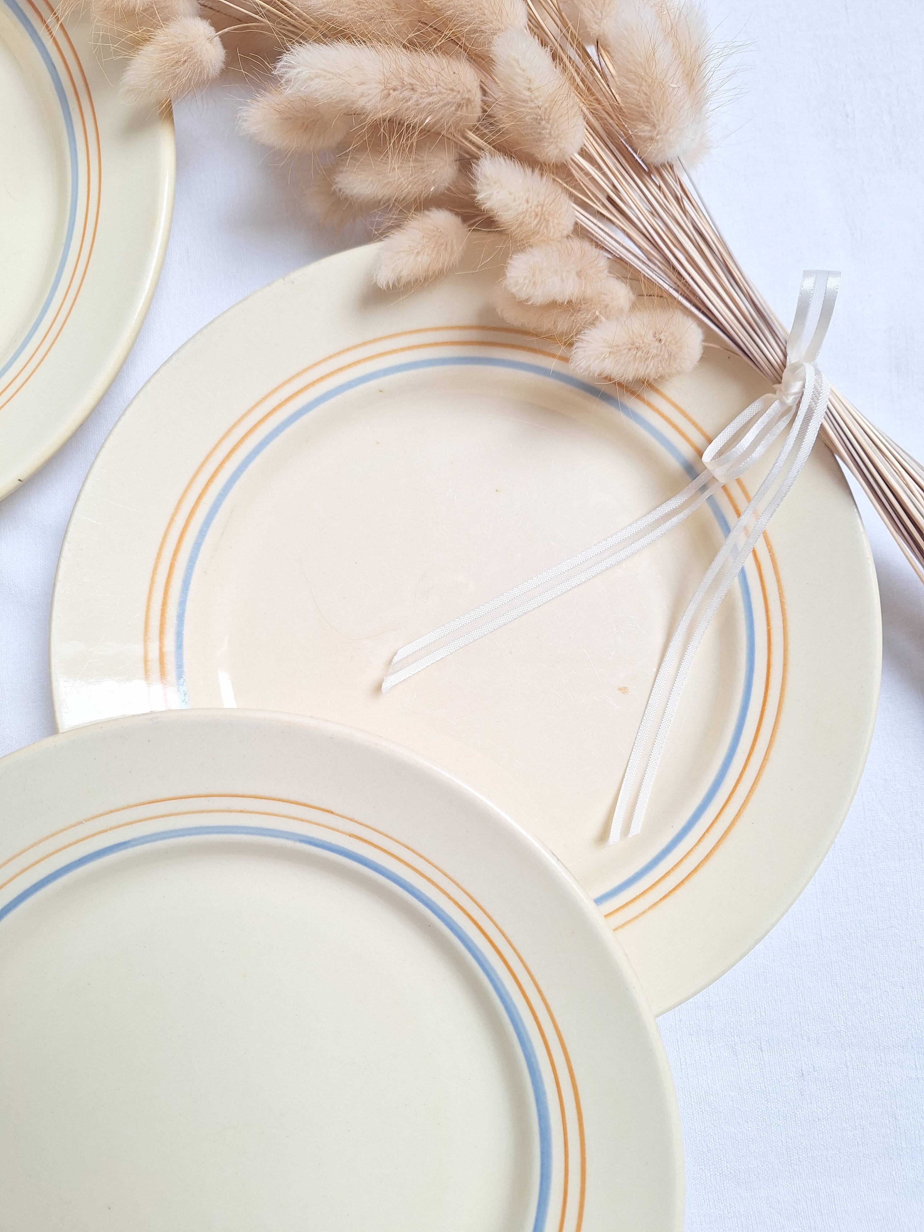 Vintage cream, orange and blue dinner plates.