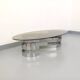 Vintage oval coffee table in smoked glass and chrome metal from the 1970s.