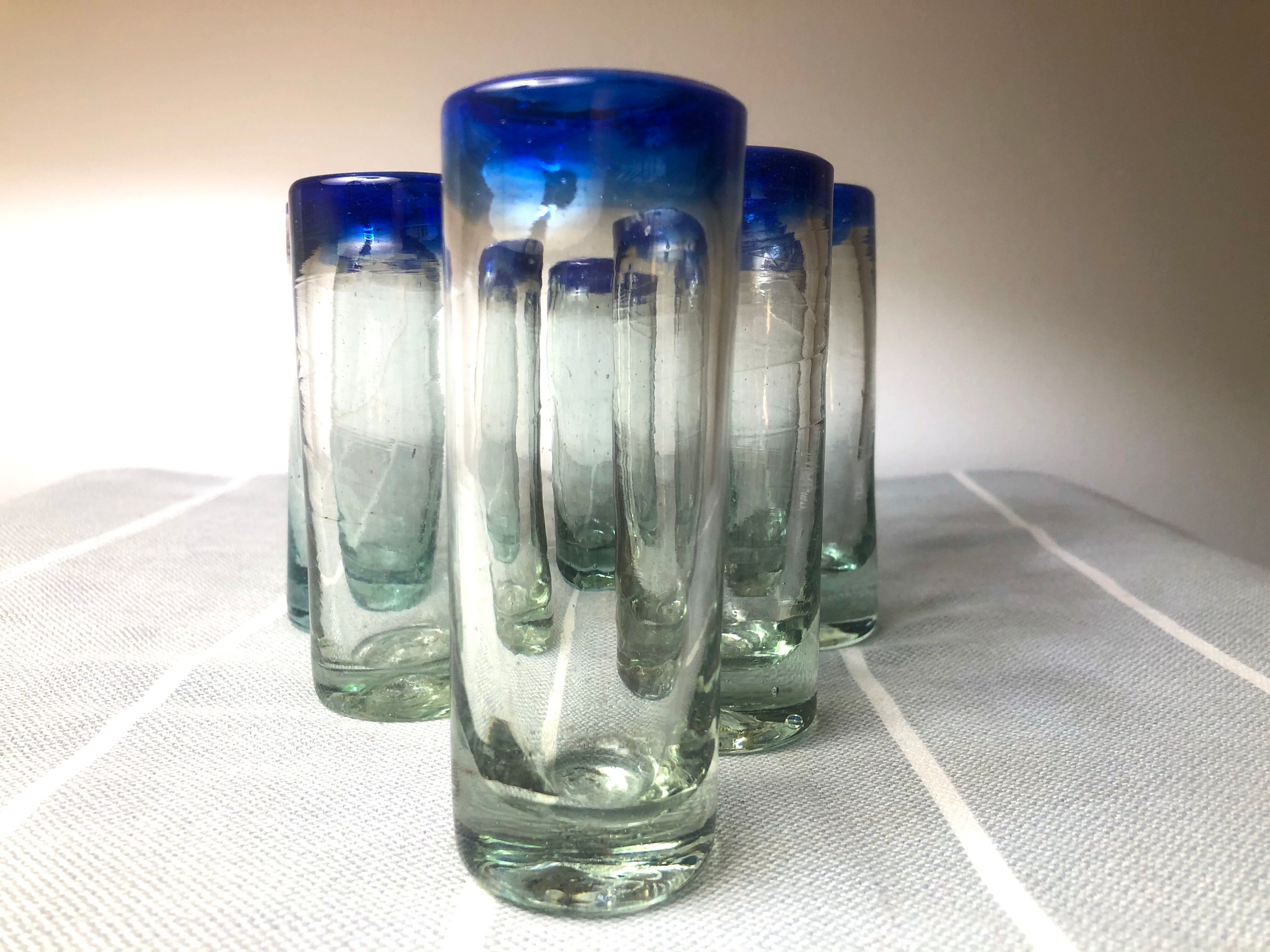 Handmade cobalt blue tequila glasses made of recycled glass