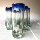 Handmade cobalt blue tequila glasses made of recycled glass