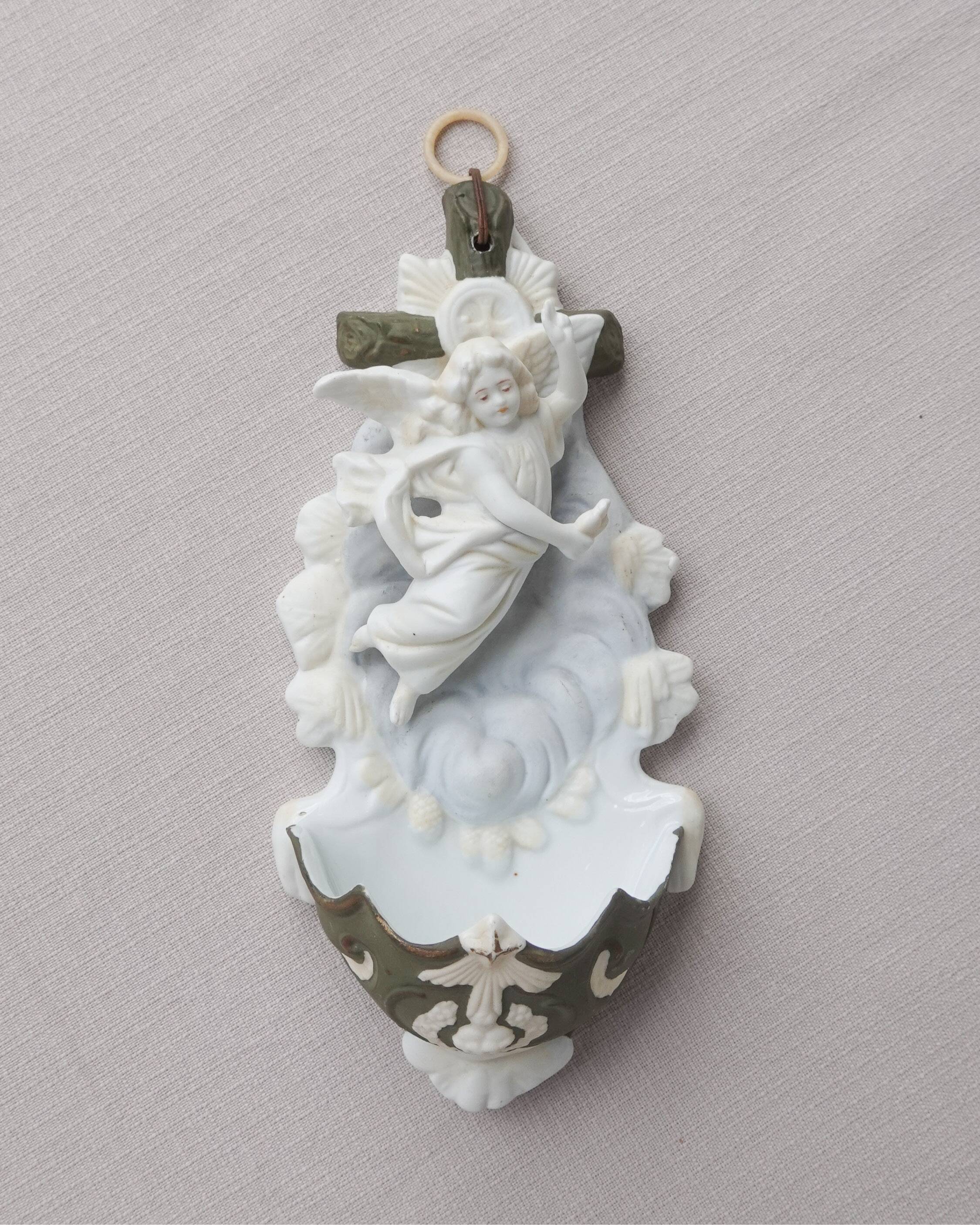 Wall angel holy water font