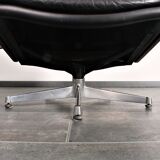 Armchair and footstool by André Vandenbeuck for Strässle in black leather