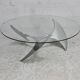 "space age" coffee table. Steel legs, glass slab. Circa 1970
