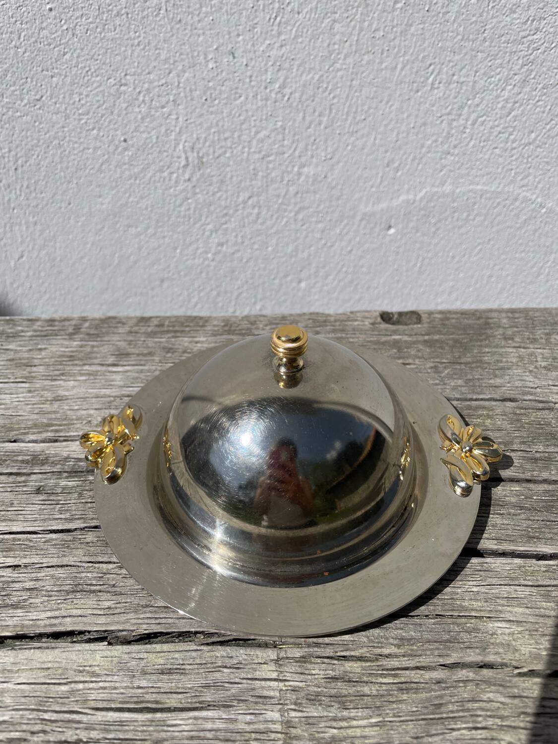 Silver-plated metal butter dish with knots