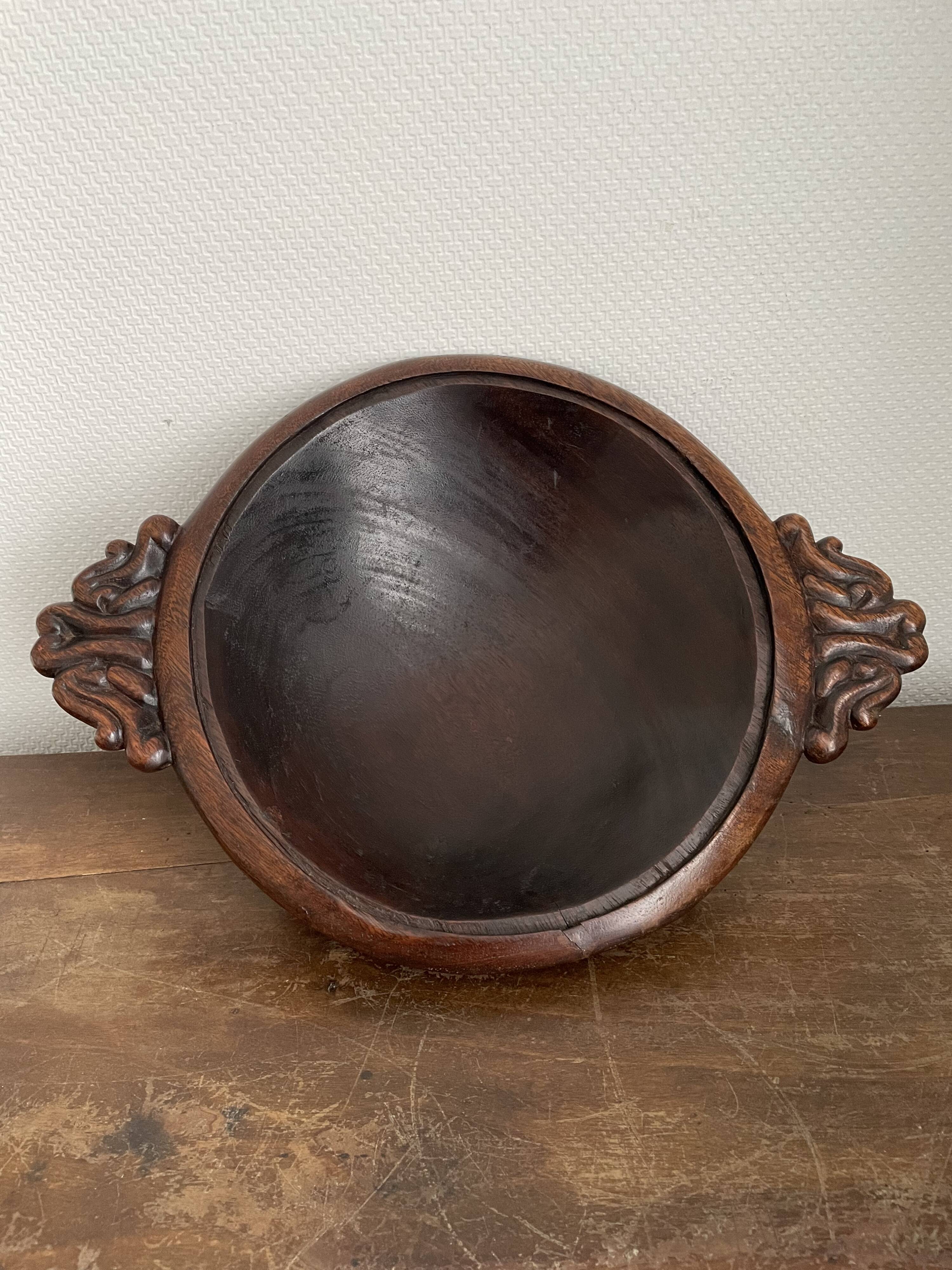 Hollow carved wooden dish