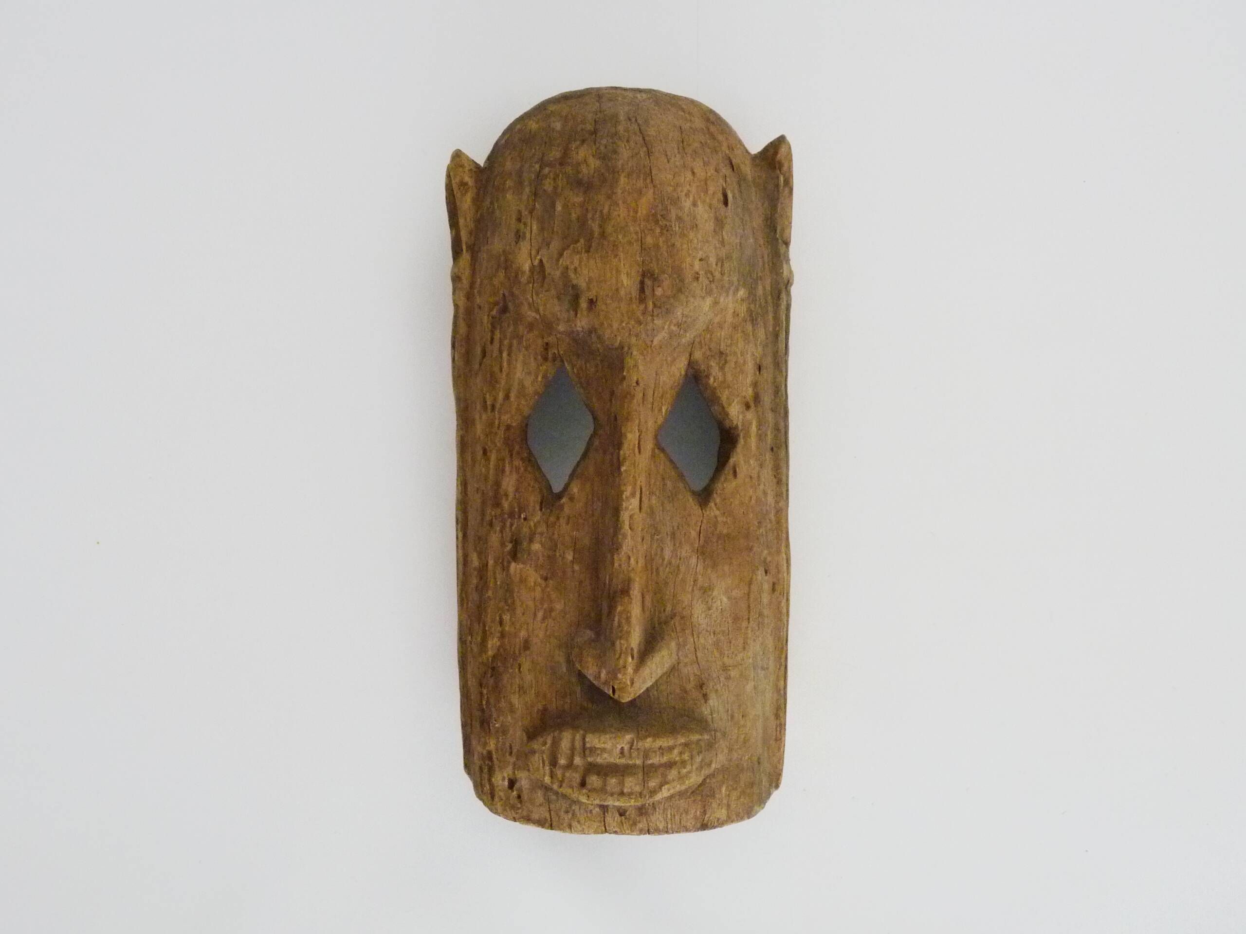 Old Dogon mask from Mali in wood. African mask from the 50s