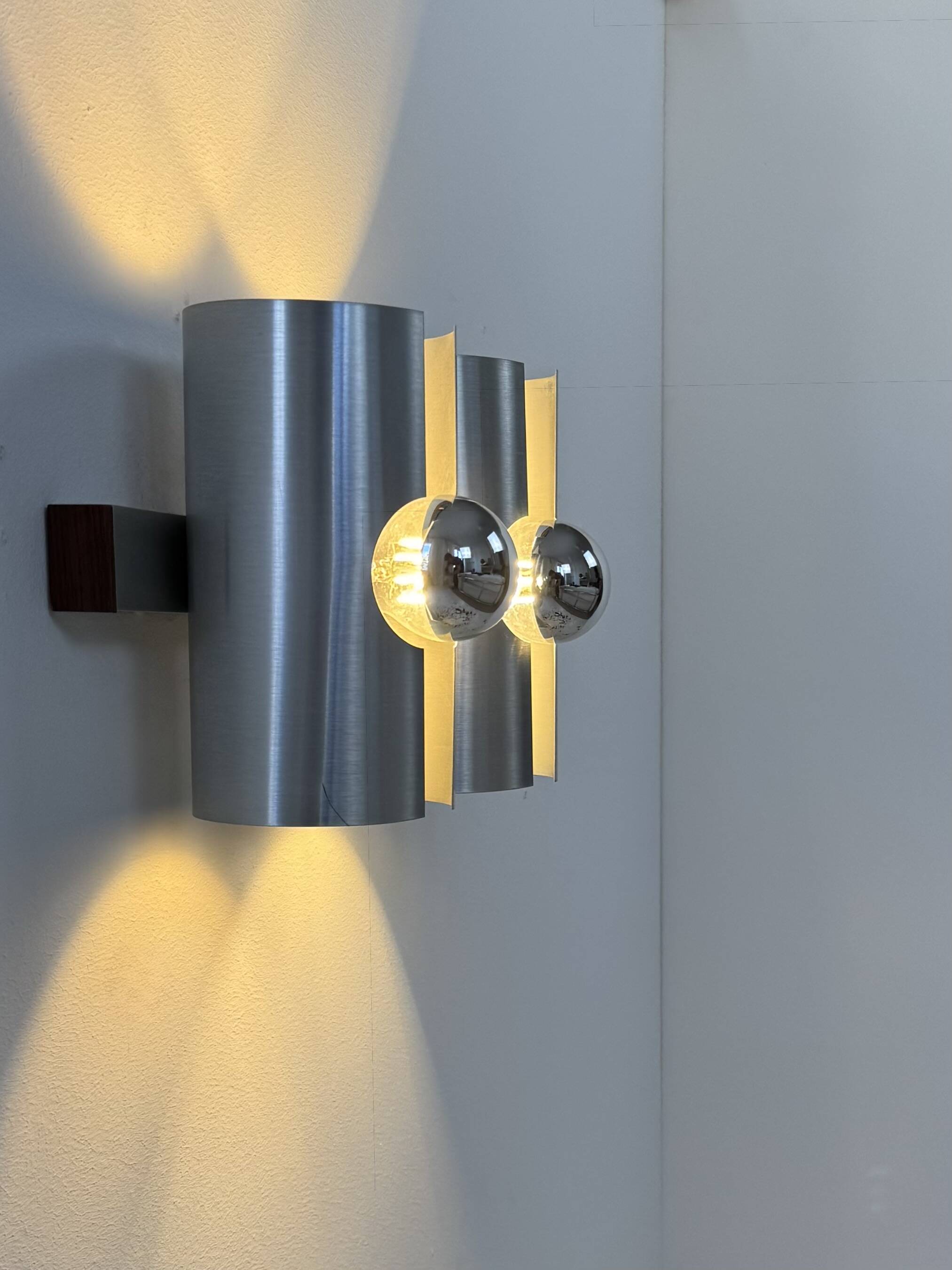 Vintage double wall light in brushed metal and rosewood, France, 1970.