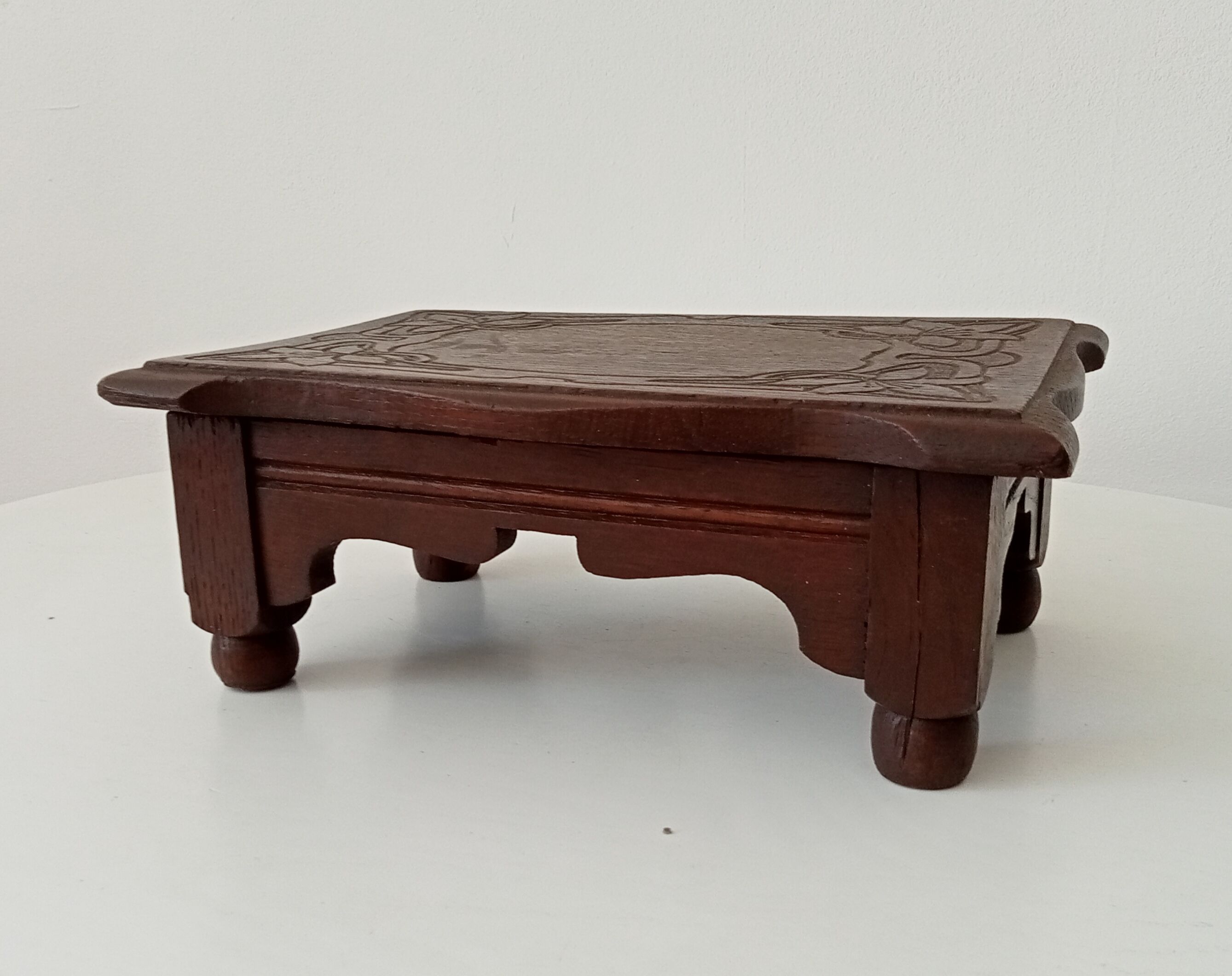 Antique carved wooden stool