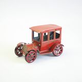 Vintage tin car with pull lever