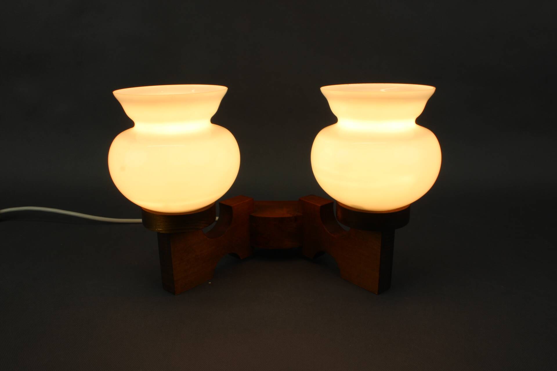 Czechoslovak wall lamp from the 1960s with Valasske Mezirici glass and a wooden base.