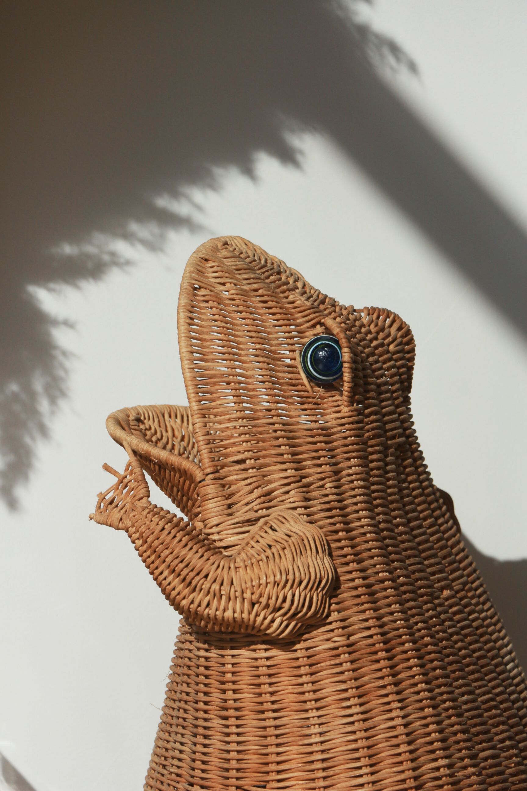Wicker frog magazine rack by Olivier Cajan