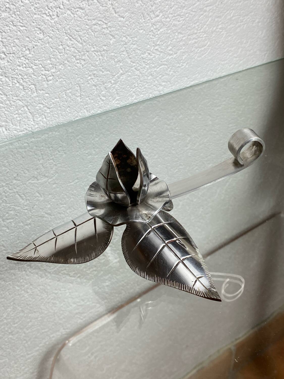 Silver-plated metal flower candle holder