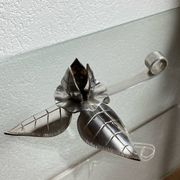 Silver-plated metal flower candle holder