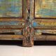 Old wooden entrance buffet in blue and yellow tones (circa 1920).
