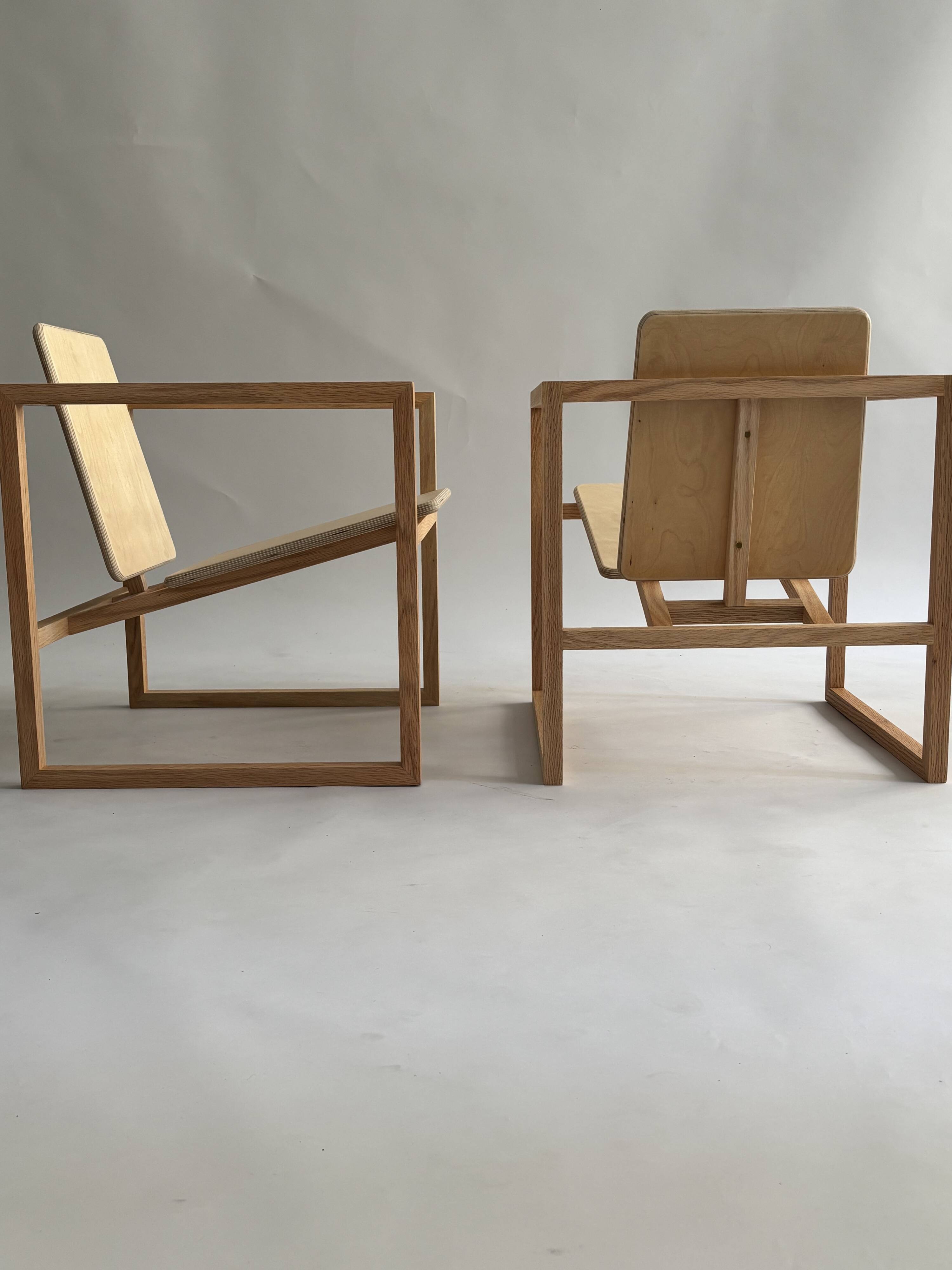 Pair of handmade wooden armchairs