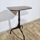 Antique octagonal mahogany side table on a classic tripod, 19th century.