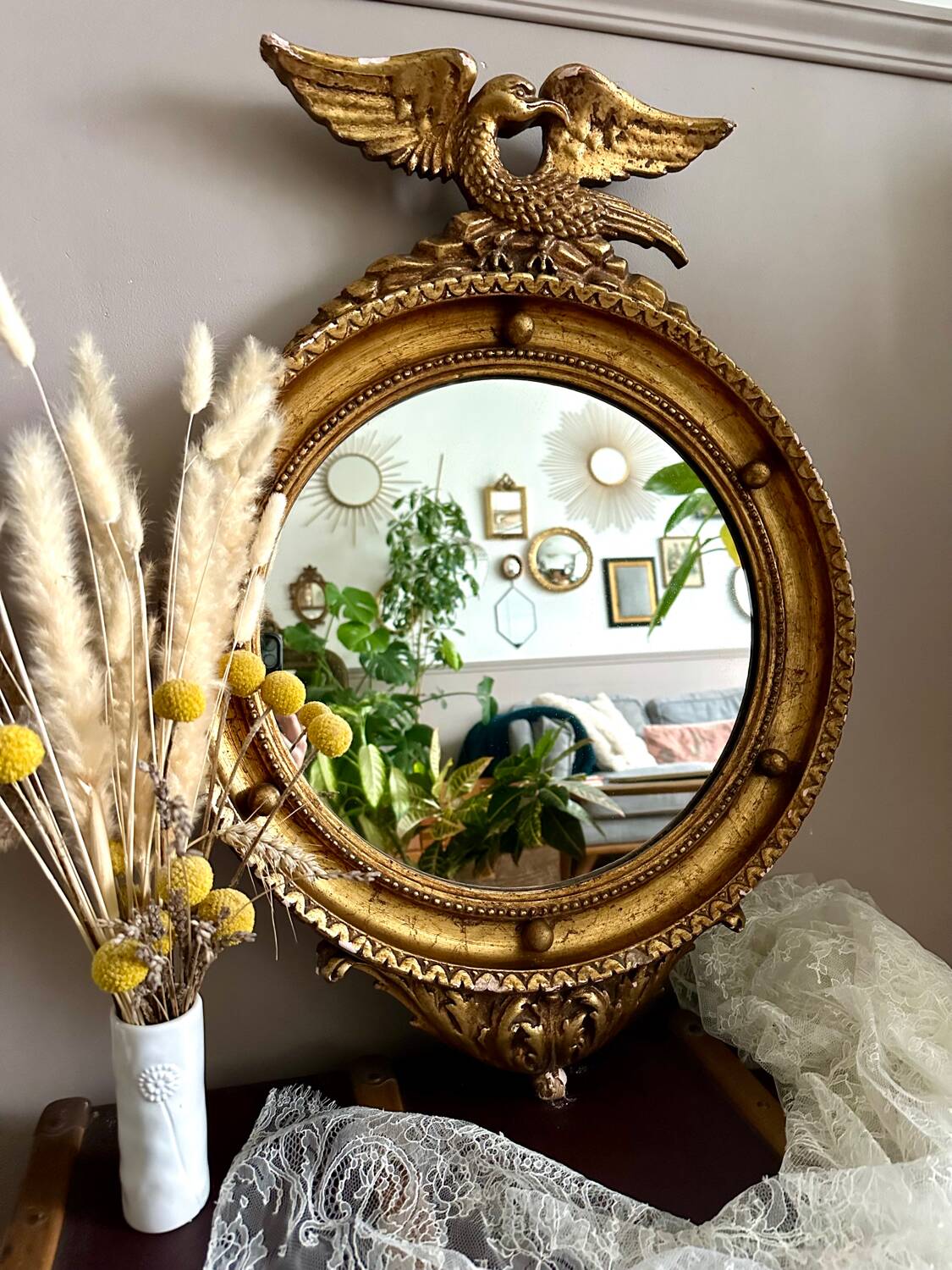 Antique gilded mirror decorated with an eagle