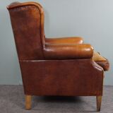 Armchair in patinated sheepskin leather