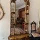 Golden Rococo-style mirror with chest
