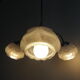 Suspension with 3 brass lights and a white glass globe from the 1950s-1960s.