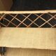 Colonial style rattan wall shelf