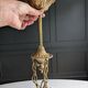 Vintage chandelier with cherubs and frosted glass flowers.