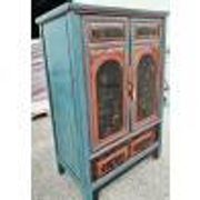 Restored antique Vietnamese wardrobe with care.