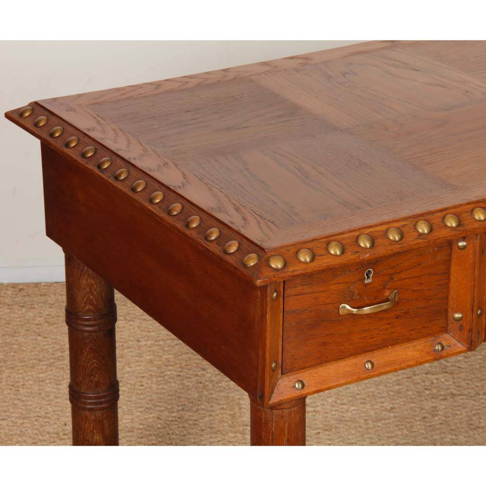 Oak and brass desk in the style of Charles Dudouyt, 1940.