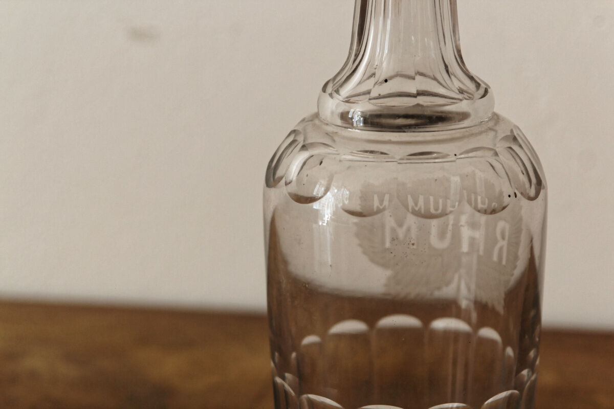 Chiseled glass rum bottle