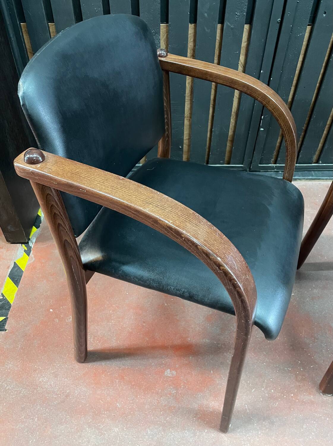 Pair of wooden and leatherette armchairs from the 80s