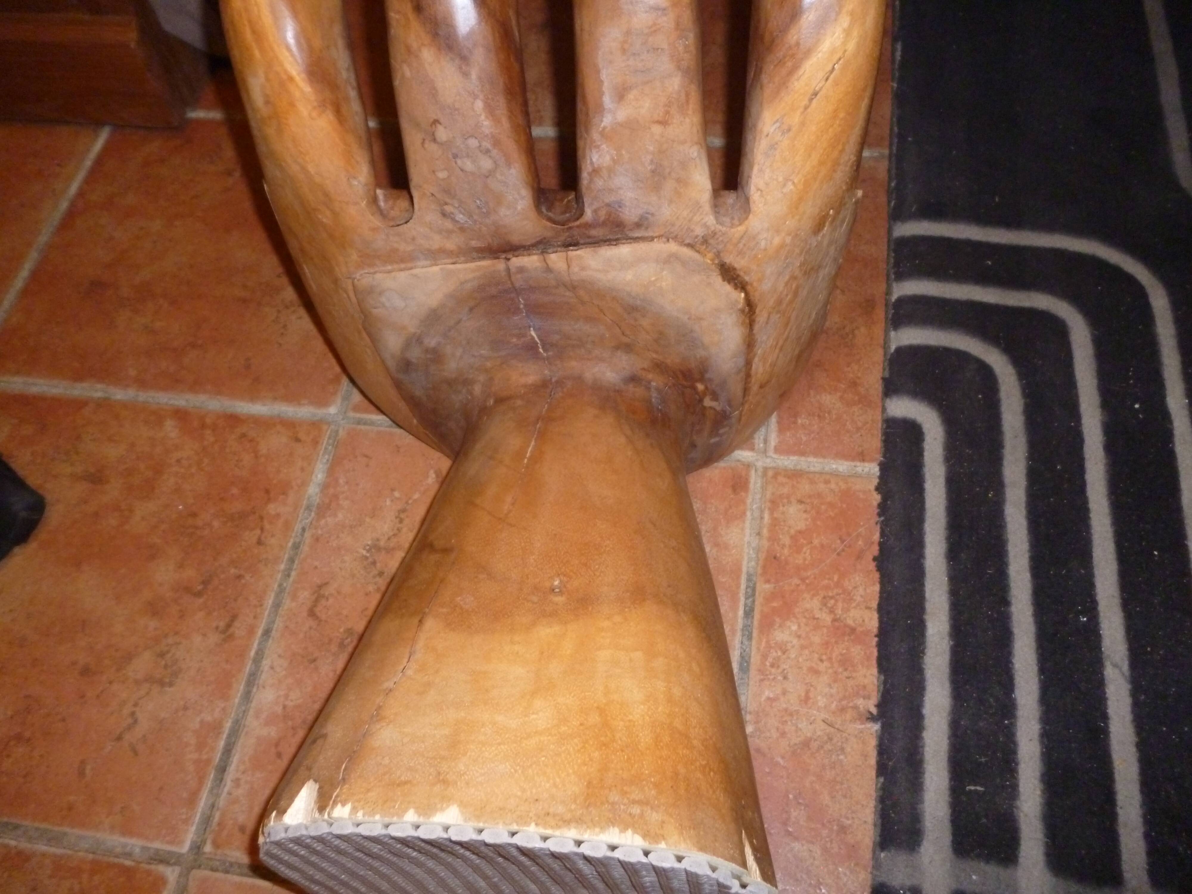 Vintage wooden hand-shaped chair