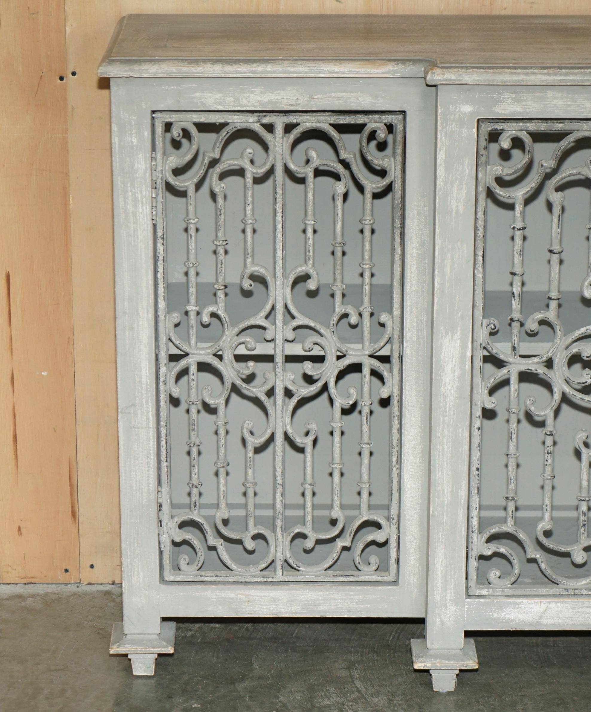 Vintage sideboard with wrought iron doors