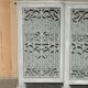 Vintage sideboard with wrought iron doors