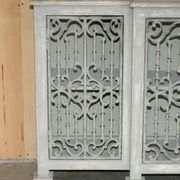 Vintage sideboard with wrought iron doors