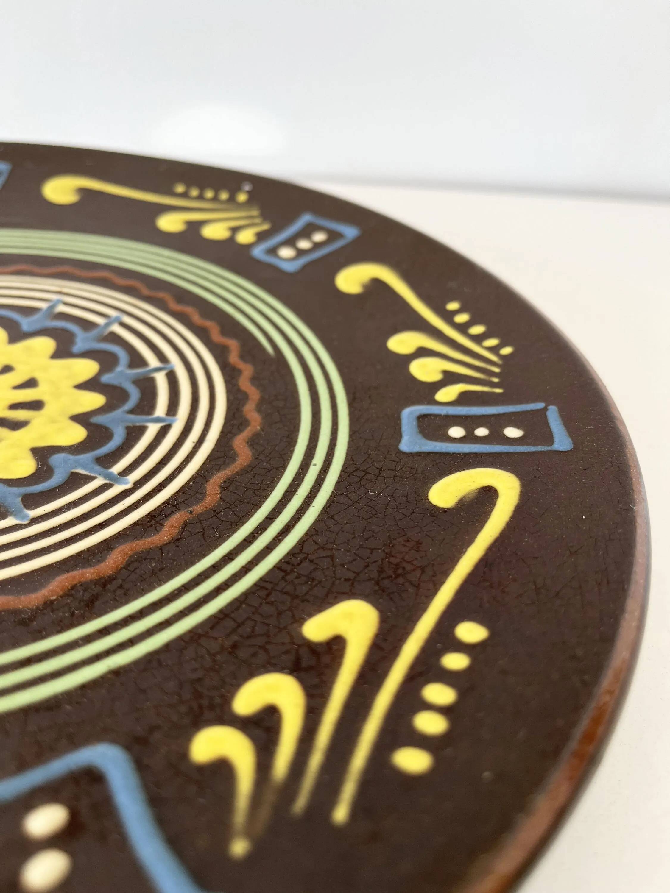 Large brown ceramic platter, 1960