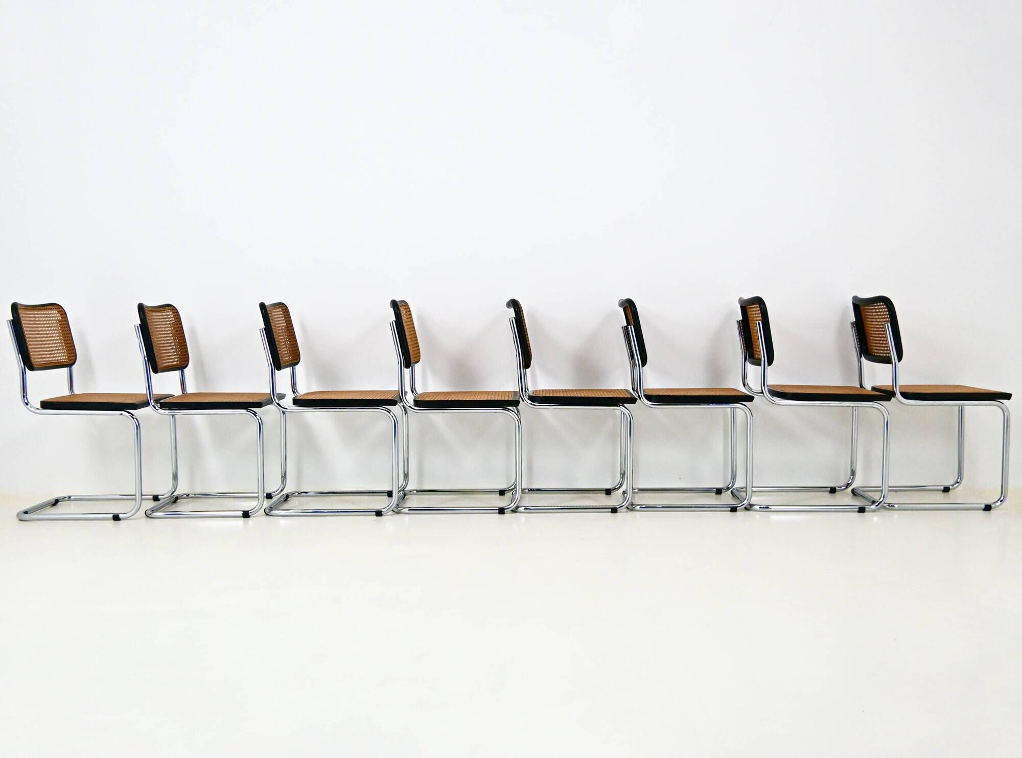 Set of 8 B32 model dining chairs by Marcel Breuer.