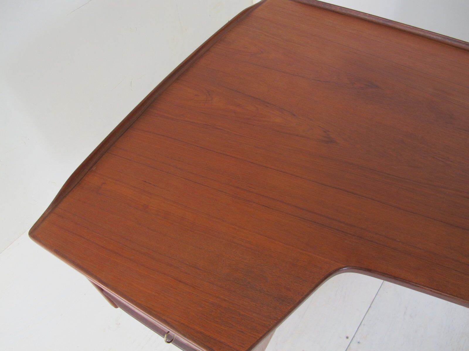 Boomerang desk in teak by Peter Lavig Nielsen for Denmark, 1950s