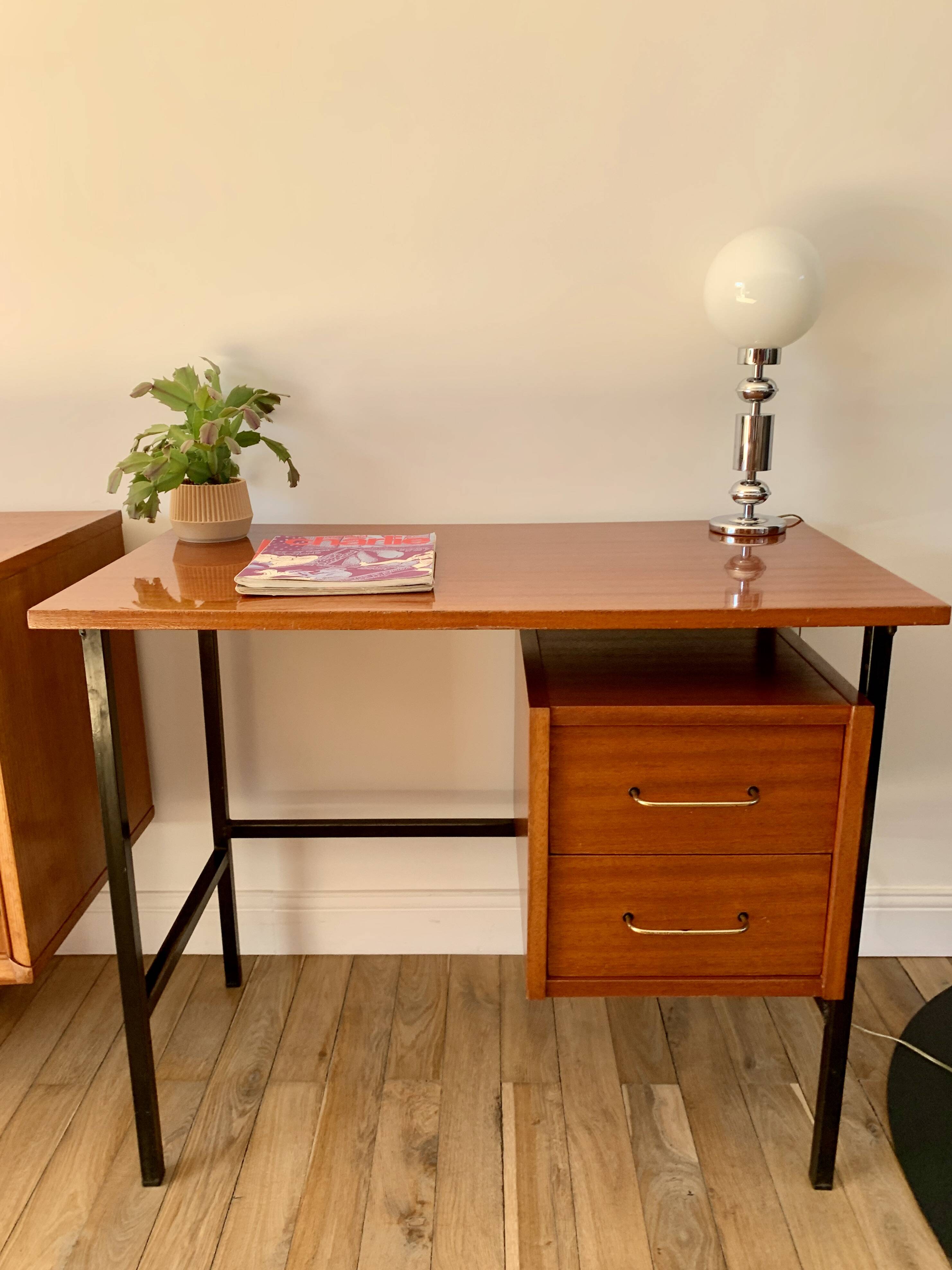 lacquered wood desk and black steel legs design from the 60s and 70s