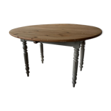 Round wooden table with flaps